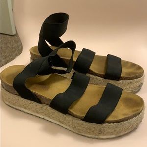 Espadrille and black platform sandals